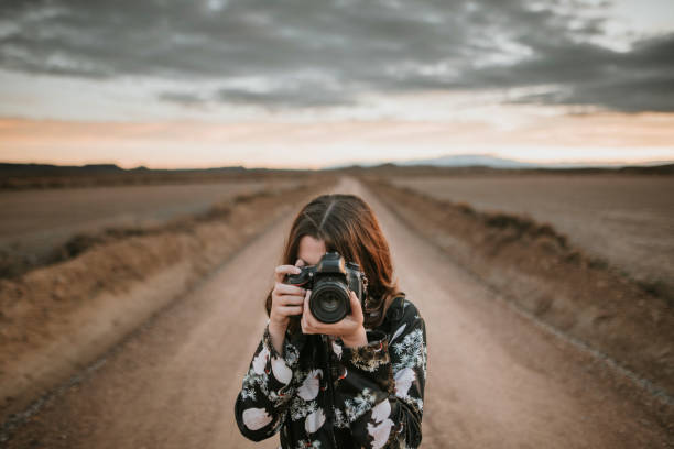 Young woman taking a picture