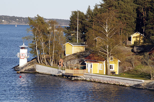 Phare et jaune maisons - Photo