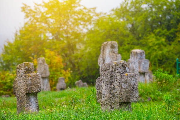 istock old medieval cemetery at the misty day 902520564