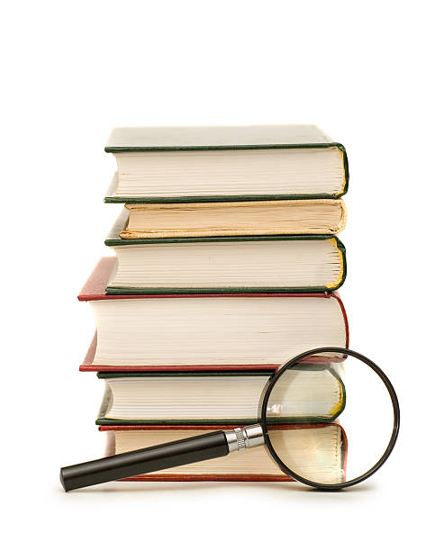 istock Magnifying Glass Near Books 90252084