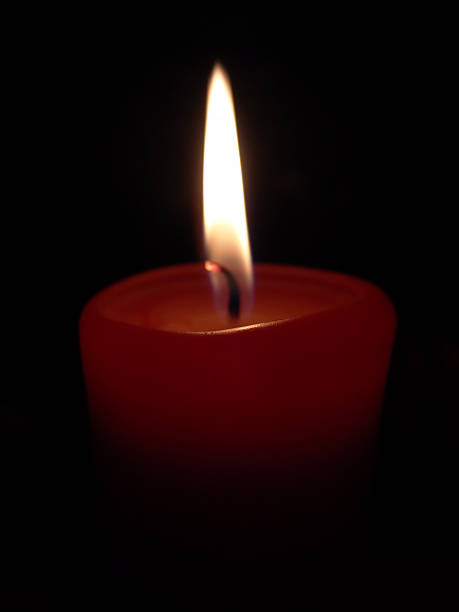 Candle in the Dark stock photo