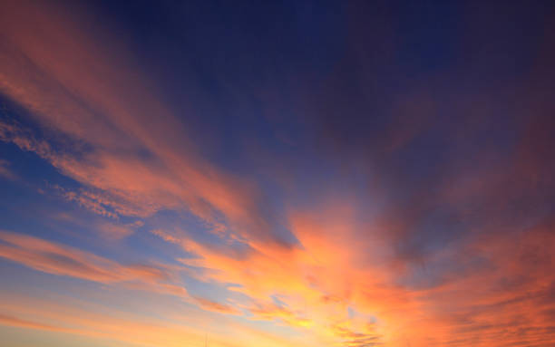 istock landscape with colored clouds above the earth 902529240
