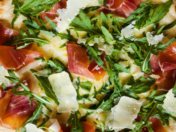 istock salmon and arugula pizza background meal recipe 902545394