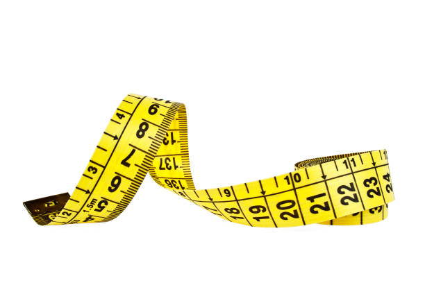 istock Yellow measuring tape isolated on white background 902568204