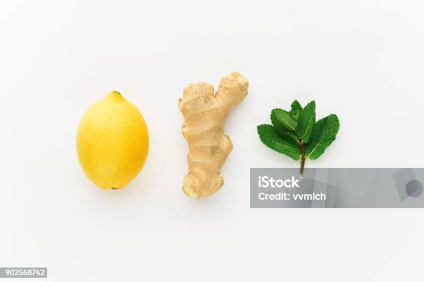 Minimalism Lemon And Ginger On A White Background Concept Of Increasing Immunity In Winter Stock Photo - Download Image Now