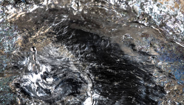 istock surface of molten metal 902571680