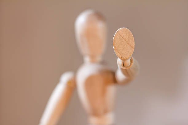 istock Wooden mannequin isolated on white background 902576276