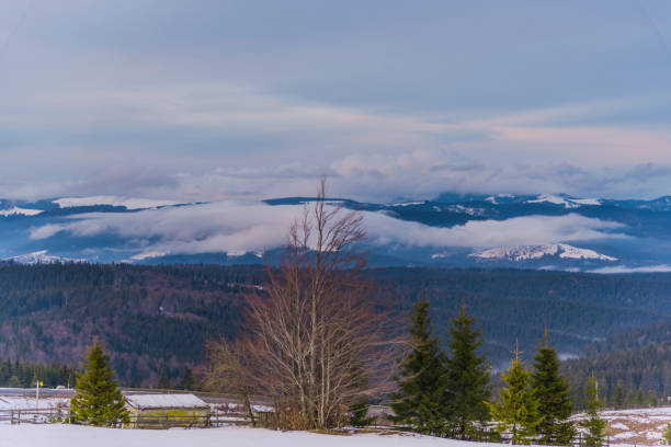 istock Winter sunset in Tihuta, Romania 902584630