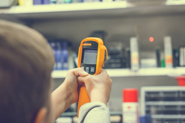 istock Close up of measuring temperature with infrared thermometer. 902601776