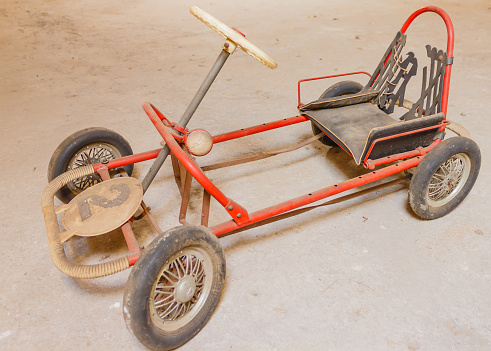close-up of an old go-kart for children