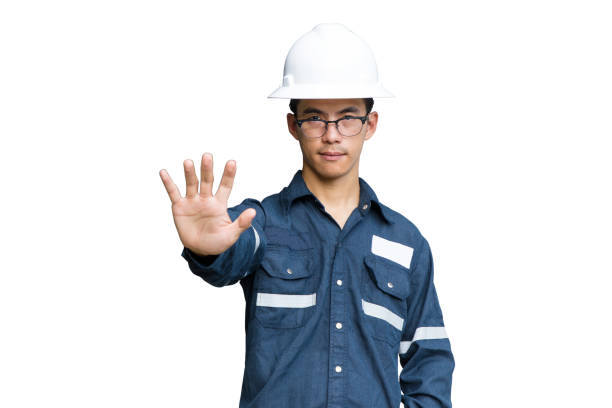 istock Asian man,Engineer or Technician in white helmet, glasses and blue working shirt suit with stop work concept, isolated on white, mechanic and Oil and Gas industrial with clipping path. 902613324