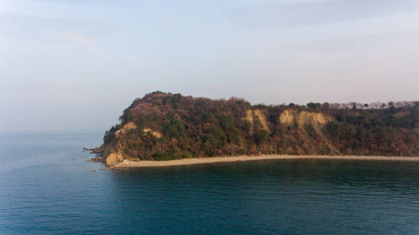istock Aerial view of cliffs shoreline. 902613506