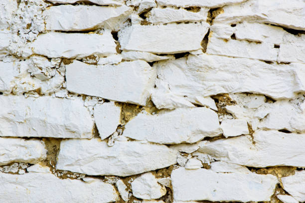 istock pattern gray color of modern style design decorative uneven cracked real stone wall surface. 902613914