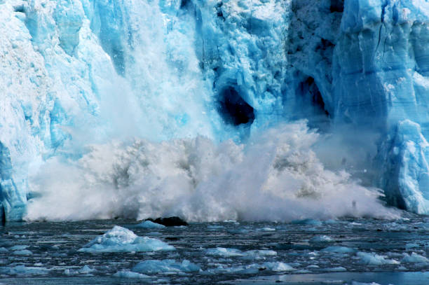 istock Beautiful blue glacier calving 902619660