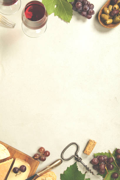 istock Wine appetizers set: French cheese selection, grapes and walnuts on concretebackground 902623768