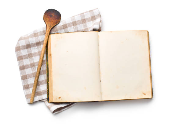ouvert livre de recettes - spoon napkin silverware white photos et images de collection
