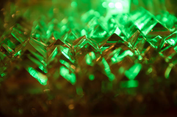 istock Close up of cut crystal in mysterious emerald light.Magic shiny background 902628808