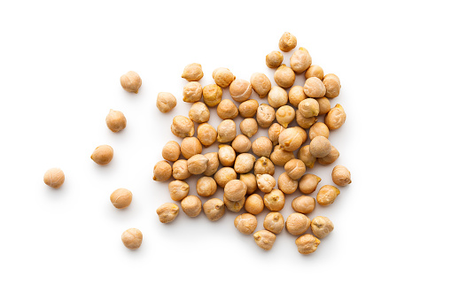uncooked chickpeas on white background