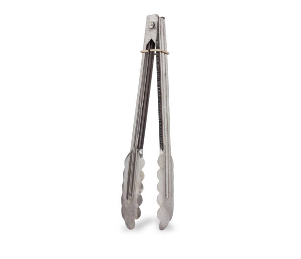 Stainless steel ice tongs,isolated on white background with clipping path. stock photo