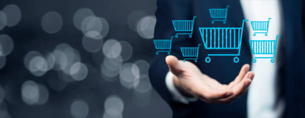 istock Businessman pressing shopping basket icon 902640116