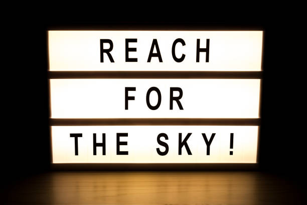 istock Reach for the sky light box sign board 902644264
