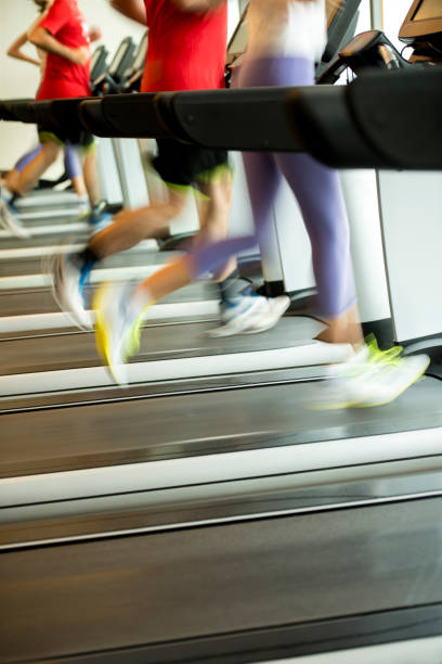 istock Exercising in the gym 902646778