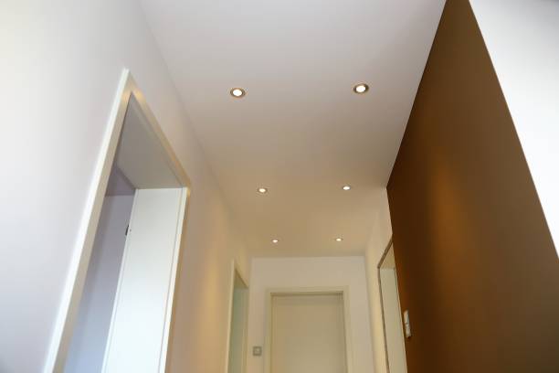 istock New renovated room with illuminated ceiling 902647224