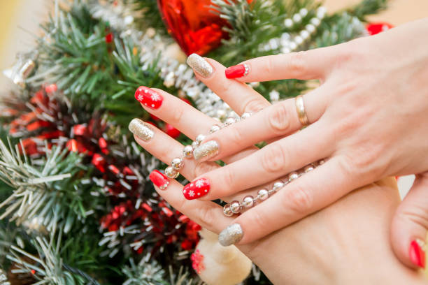 istock Christmas nail art manicure 902651594