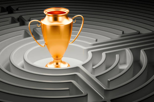 istock Gold trophy cup award inside labyrinth maze. 3D rendering 902654824