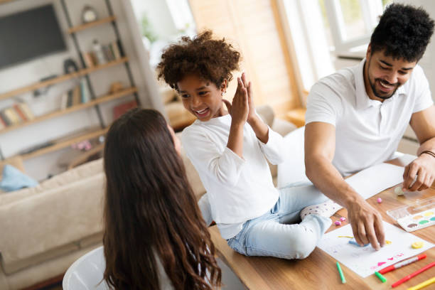 istock Happy familiy spending fun time at home 902655280