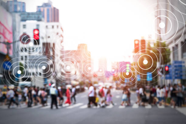 istock Big data , Iot , Internet of things every where , beacon and smart city technology concept. Neural networks connect signal graphic and blur group of people in metropolis. 902668916