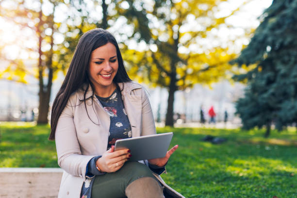 istock Woman at public park 902674022