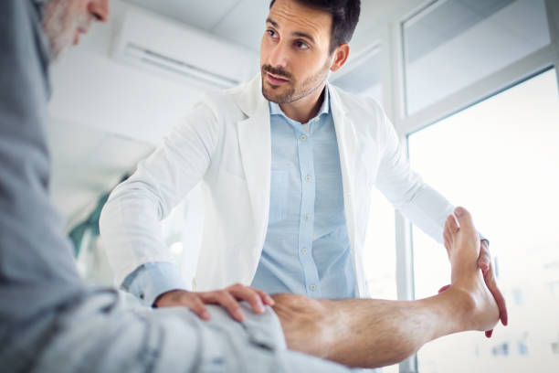 istock Senior man having medical exam. 902677652