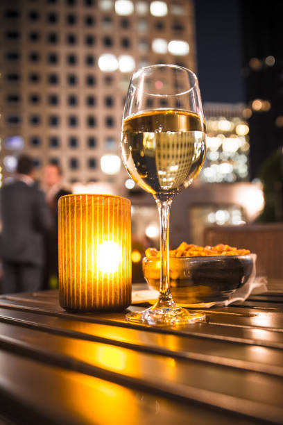 istock wine with candle and buildings 902680120