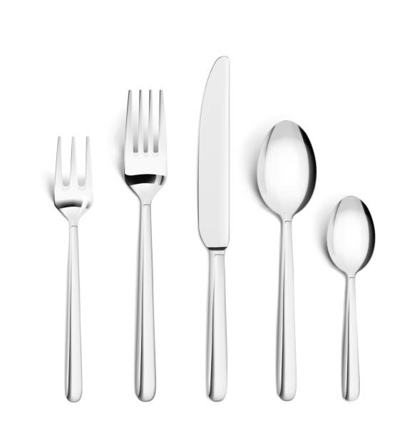 istock Set of realistic forks, knife and spoon isolated on white. 902680242