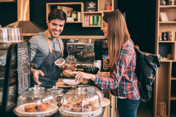 istock Woman buying cookies 902680544
