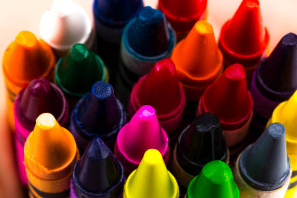istock Group of Stacked Pile of Crayons Top View 902690524