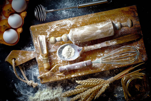 istock Dough with flour on an old background 902693368