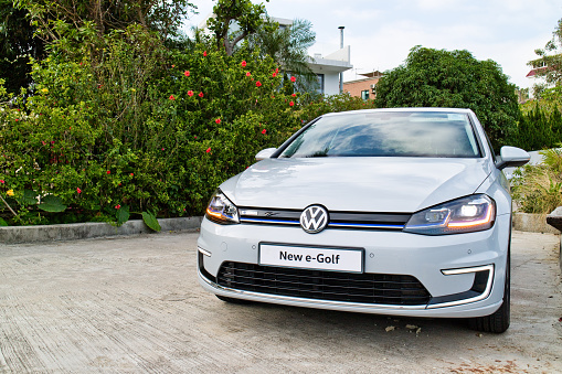 Porto, Portugal - 11 December, 2019: Volkswagen Golf cars stopped on the public parking before drives. The Golf Mk8 was debut in 2019 on the market. This model is the most popular compact car in Europe.