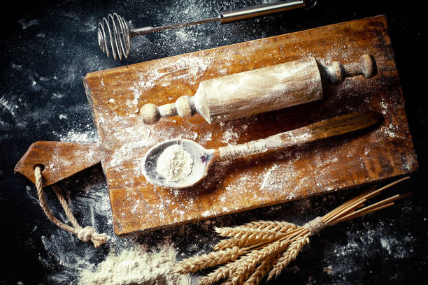 istock Dough and flour on an old background 902700194