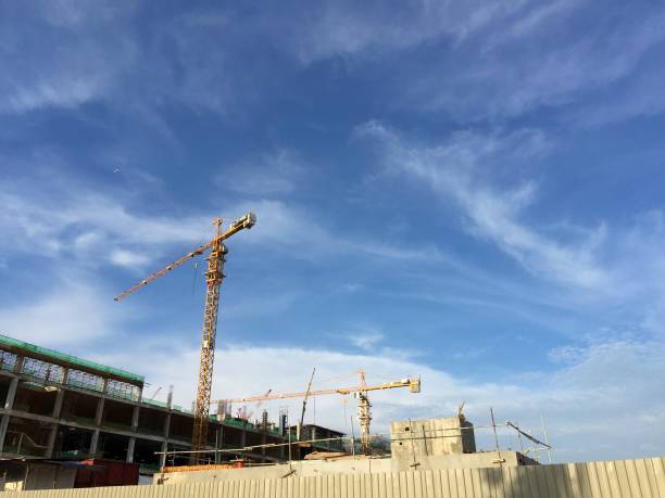 istock Boom crane at the construction site 902702892