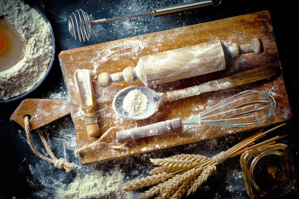 istock Dough and flour on an old background 902703428