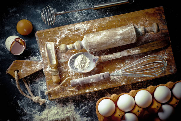 istock Dough and flour on an old background 902703528