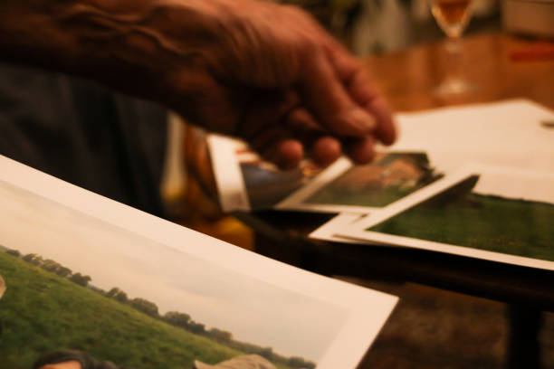 istock Sifting Through Photo Memories 902703636
