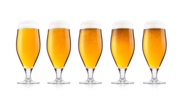 istock Cold glasses of lager beer with foam and dew 902705940