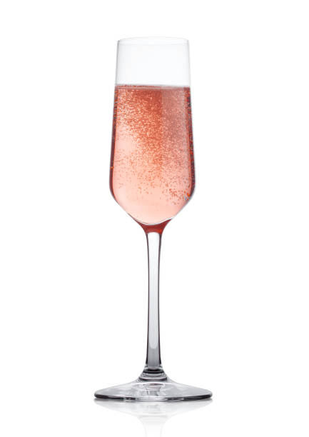 istock Rose pink champagne glass with bubbles isolated 902706756