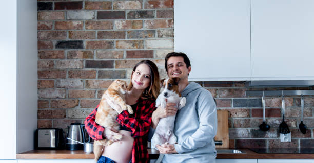 istock young family with pets 902712712
