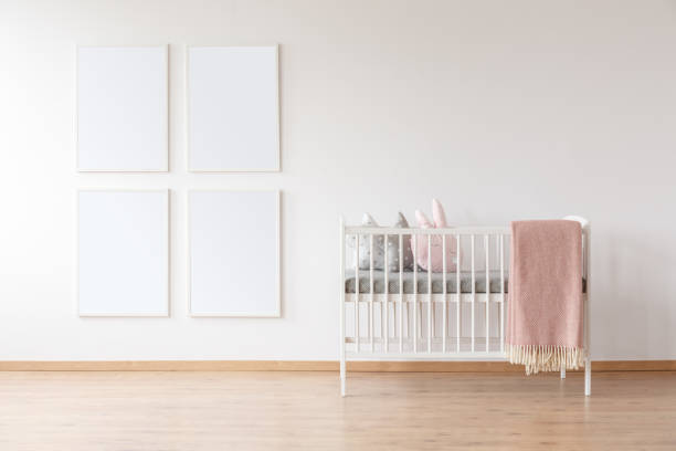 istock White crib and poster mockups 902712916