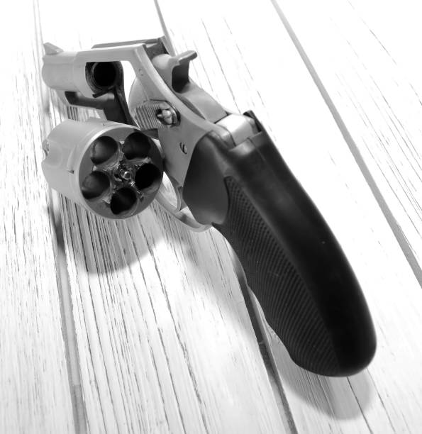 istock Close up of a revolver on a table 902712984
