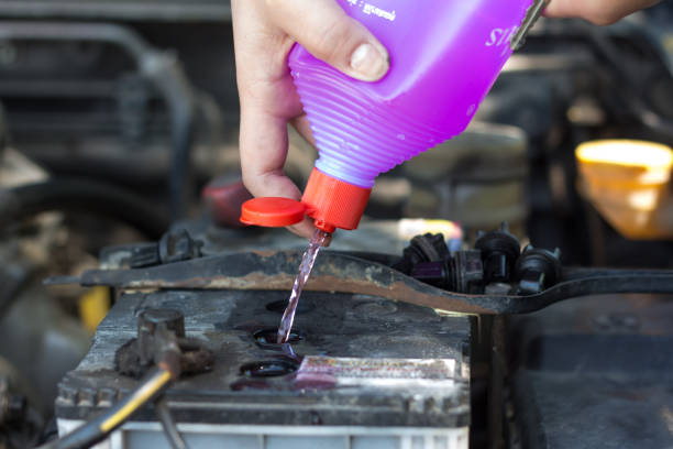 istock Fill distilled water in the battery 902713094